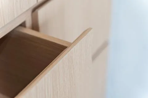 Close-up of light woodgrain cabinetry and finished edges